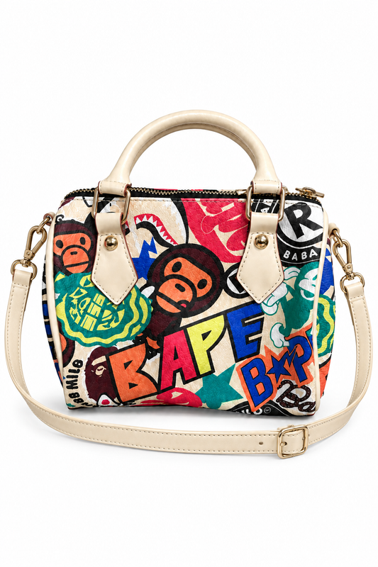 Colorful mini satchel with cream-colored shoulder strap on white background; digitally edited image