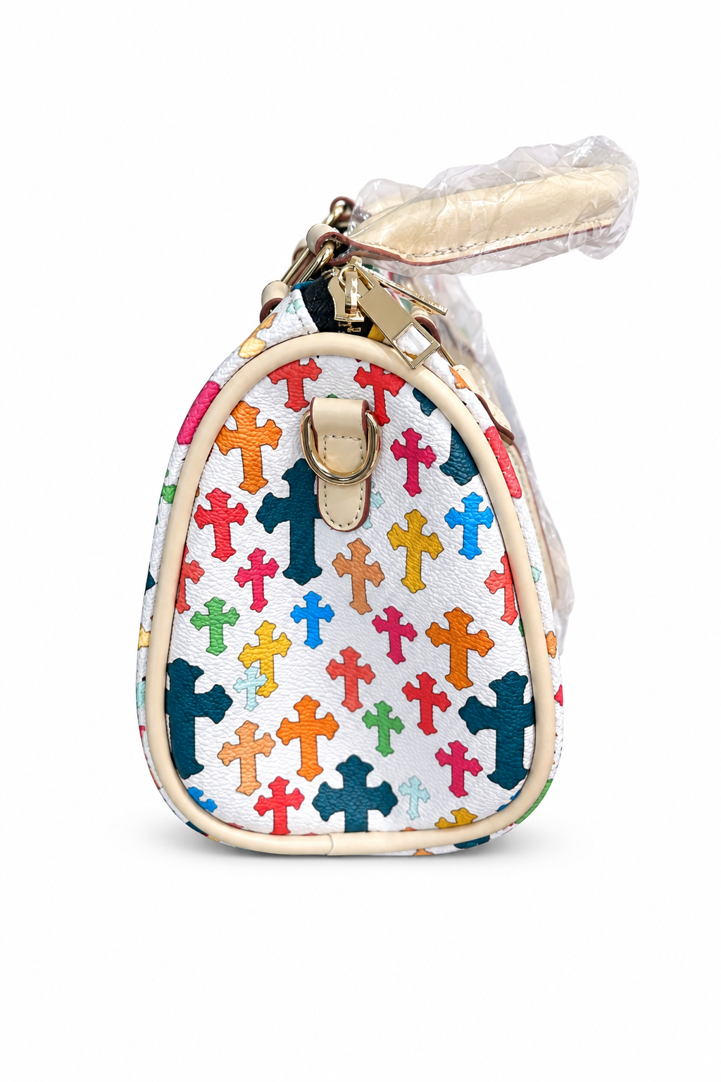 Side view of colorful cross pillow bag on white background